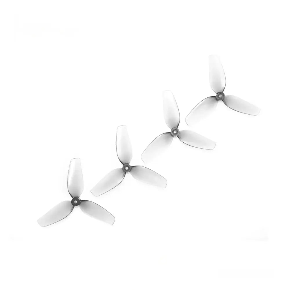 Quatre hélices FPV HQprop 45MMX3 1.8 pouces à 3 pales, en polycarbonate gris translucide.